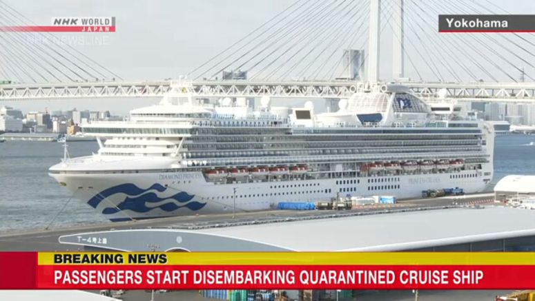 Passengers start disembarking quarantined cruise Passengers start disembarking quarantined cruise
