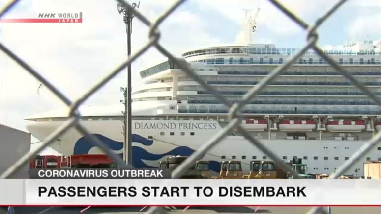 Passengers disembarking cruise ship