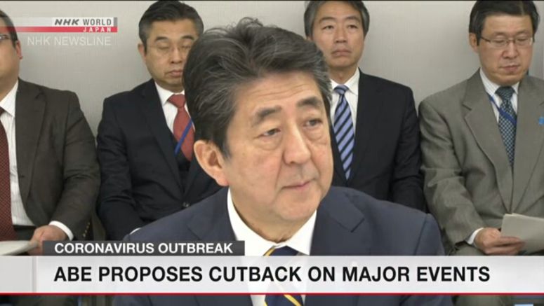 Japan PM Abe proposes cutback on major events
