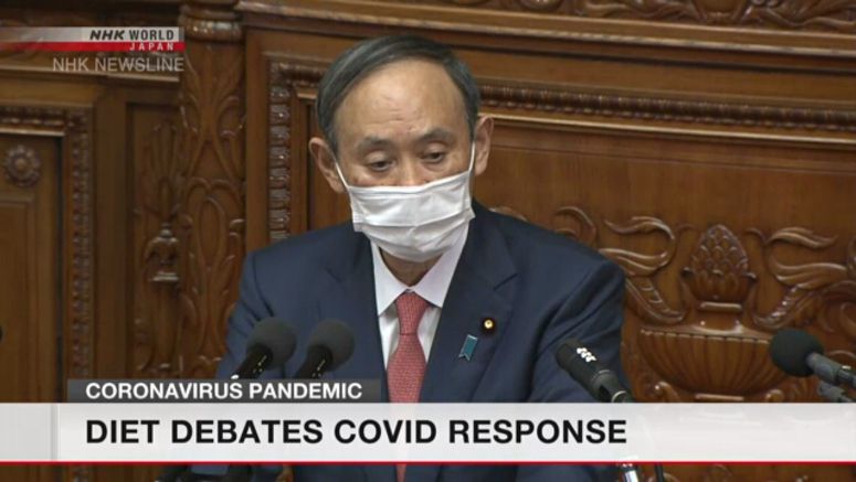 Suga defends government's coronavirus policies
