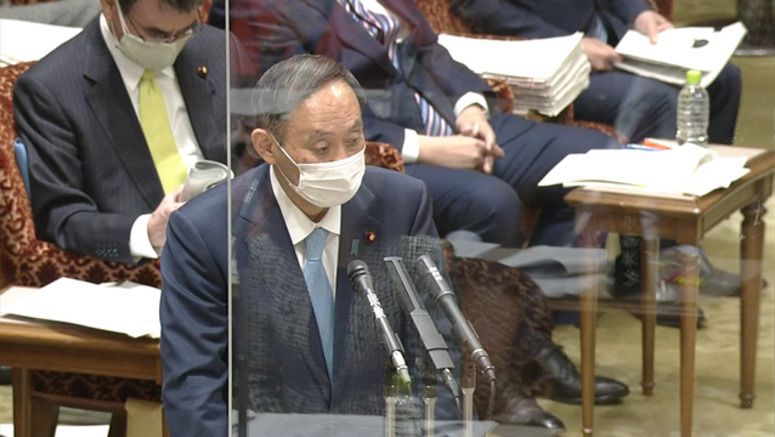 Suga apologizes over lawmakers' late-night outing