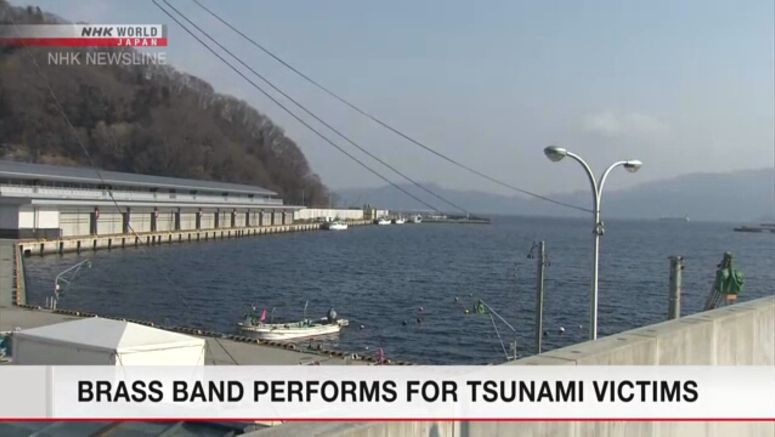 Brass band performs for tsunami victims