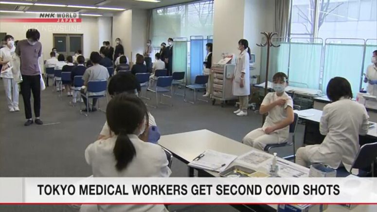 Tokyo medical workers get second vaccine shots