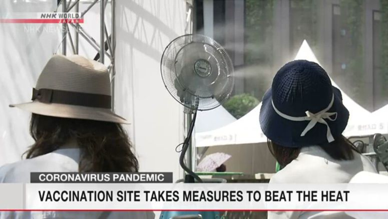 Vaccination center takes anti-heat measures