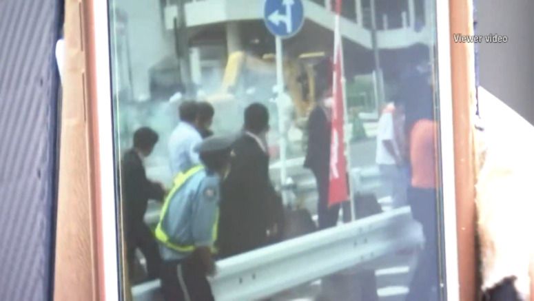 NHK footage shows what appears to be gun at Abe shooting scene