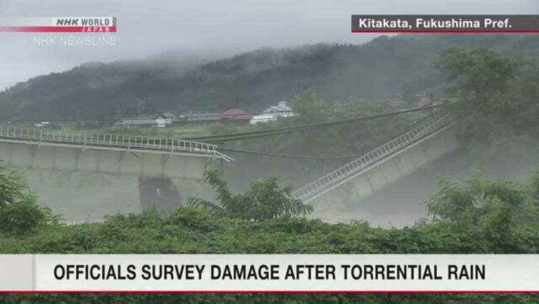 Officials survey damage after torrential rain