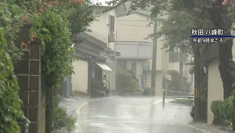 Japan hit by record rainfall, heatwave