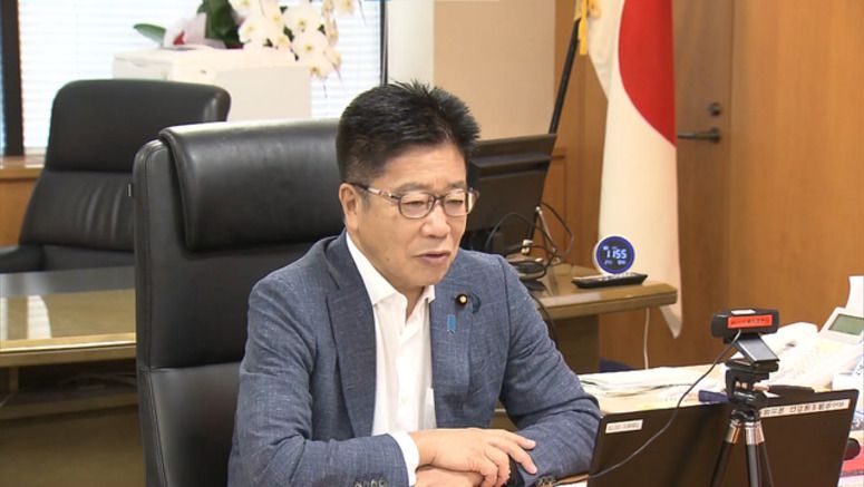 Japan's health minister: People don't need to wear masks outdoors