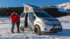 Nissan e-NV200 Winter Camper Concept is a green pop-top camper