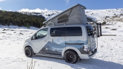 Nissan e-NV200 Winter Camper Concept is a green pop-top camper