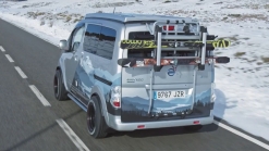 Nissan e-NV200 Winter Camper Concept is a green pop-top camper