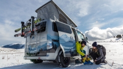 Nissan e-NV200 Winter Camper Concept is a green pop-top camper