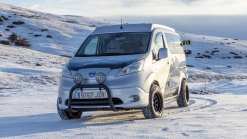 Nissan e-NV200 Winter Camper Concept is a green pop-top camper
