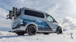 Nissan e-NV200 Winter Camper Concept is a green pop-top camper