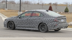 Next-generation Subaru WRX in thin camouflage appears in spy photos