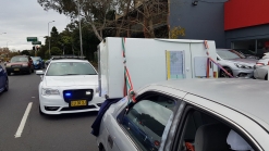 Aussie Tries To Carry Fridge On A Toyota Camry, Police Aren't Impressed