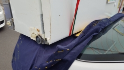 Aussie Tries To Carry Fridge On A Toyota Camry, Police Aren't Impressed