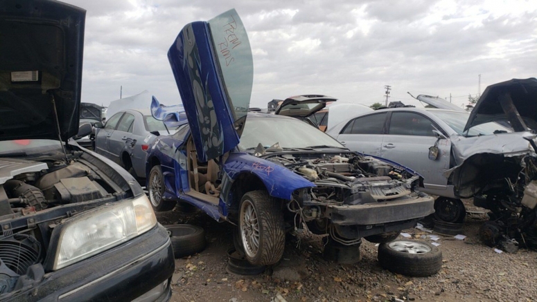 Junkyard Gem: 1998 Mitsubishi Eclipse with Lambo Doors
