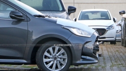 Semi-Camouflaged Toyota Yaris Hybrid Is Actually The 2023 Mazda2 For Europe