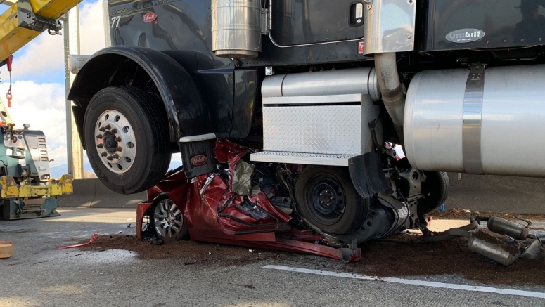 Nissan Altima Driver Somehow Survives Car Being Crushed By Semi-Truck