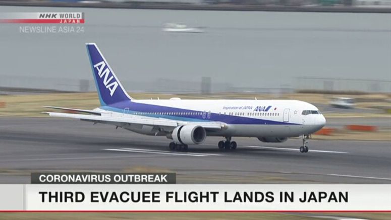 Third evacuee flight lands in Tokyo