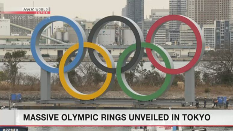 Olympic symbol monument unveiled in Tokyo Bay