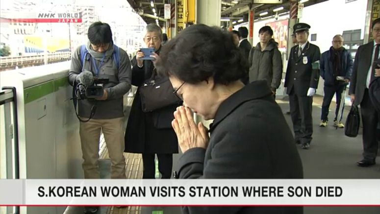 S.Korean woman remembers son's train station death