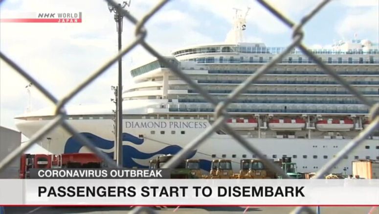 Passengers start to disembark cruise ship