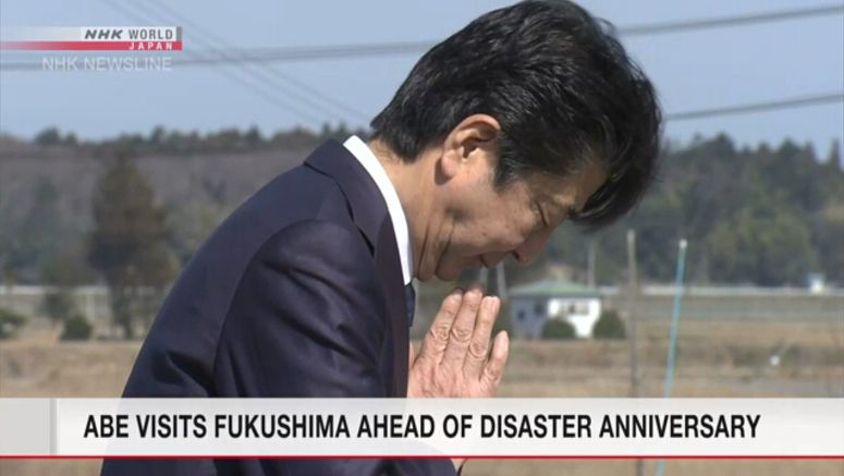 Abe visits Fukushima ahead of 9th anniversary