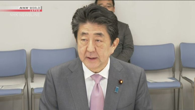 Abe: Developing vaccines, medicines top priority