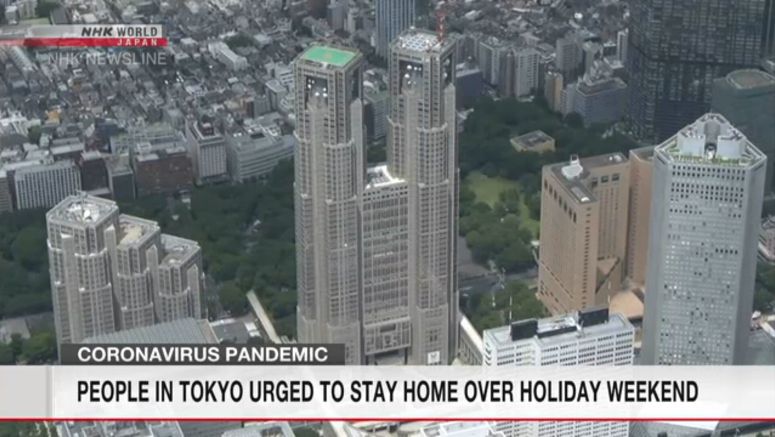 People in Tokyo urged to stay home over weekend