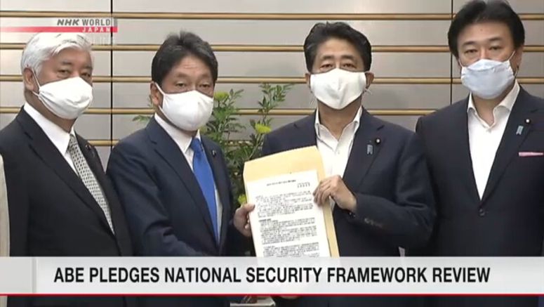 Abe calls for national security-framework review