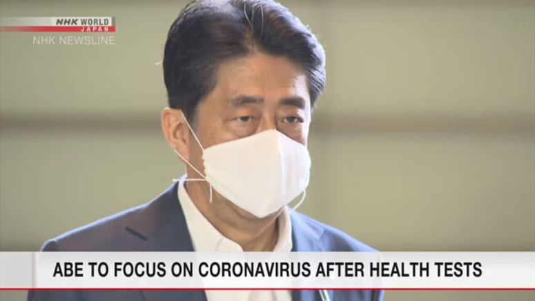 Abe returns to work after medical checks