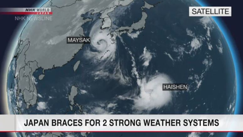 Japan braces for 2 powerful weather systems