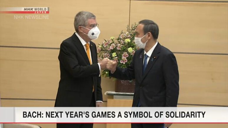 Suga, Bach renew comment to hold Tokyo Games Suga, Bach renew comment to hold Tokyo Games