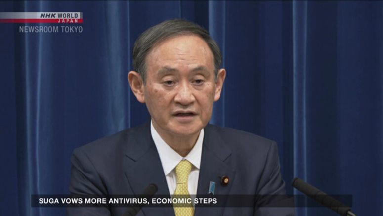 Suga urges vigilance, pledges more financial help Suga urges vigilance, pledges more financial help