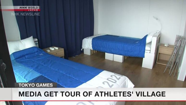 Media views Tokyo athletes' village