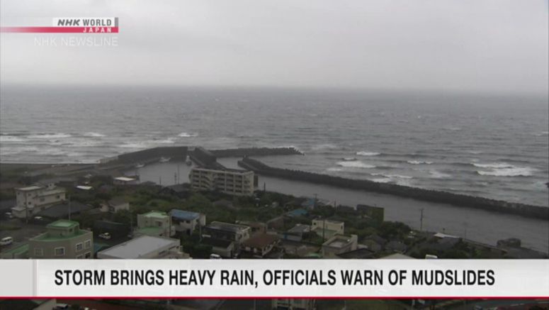 Tropical storm and moist air bring heavy rain, wreak havoc