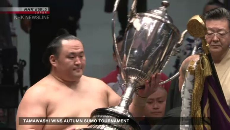 Rank - and - filer Tamawashi wins autumn sumo tournament Rank-and-filer Tamawashi wins autumn sumo tournament
