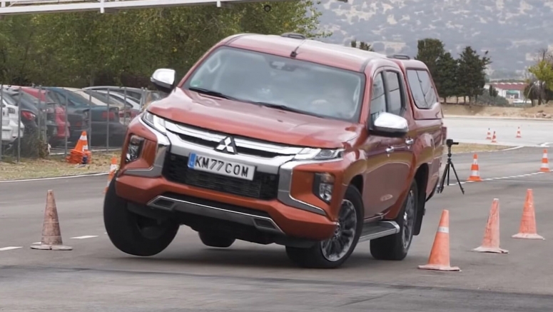 Mitsubishi L200 Isn't The Ideal Vehicle To Avoid A Moose, But It Still Beat The BMW M235i GC Mitsubishi L200 Isn't The Ideal Vehicle To Avoid A Moose, But It Still Beat The BMW M235i GC