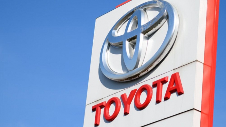 Toyota sees profit slip but beat earlier forecasts