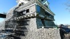 Kumamoto Castle's fortified curved stone walls rise again